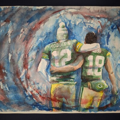 Aaron Rodgers and Randall Cobb as they walk into the tunnel at the conclusion of their last game as Green Bay Packers